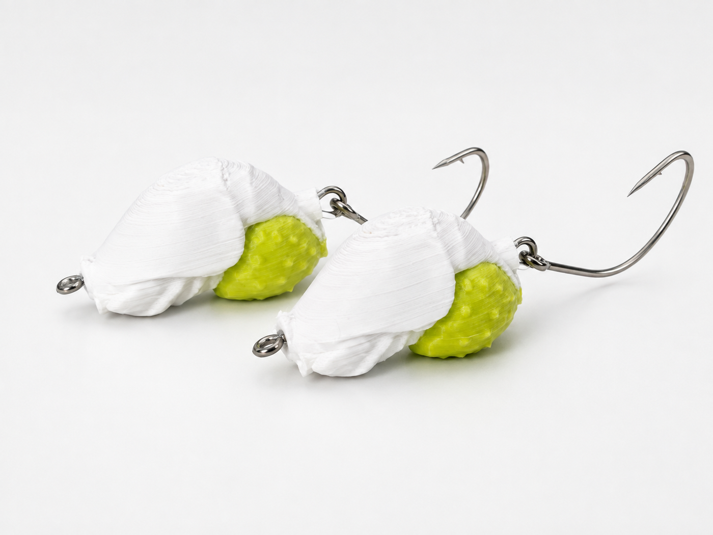 Two SandSpawn High Tide white and chartreuse artificial sand flea lures rigged and ready to fish