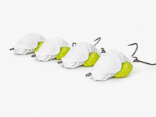 Four SandSpawn High Tide white and chartreuse artificial sand flea lures rigged and ready to fish